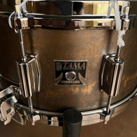 Caisse claire en laiton Tama 50th Mastercraft 6,5x14" "The Terminator" BB156