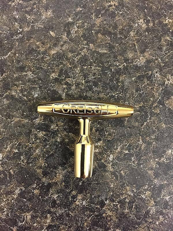 Llave de batería Gretsch bañada en oro