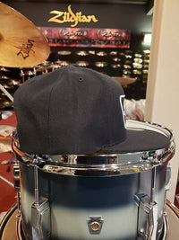 Casquette Snapback en tissu Drum Shop de Bentley en noir avec logo blanc