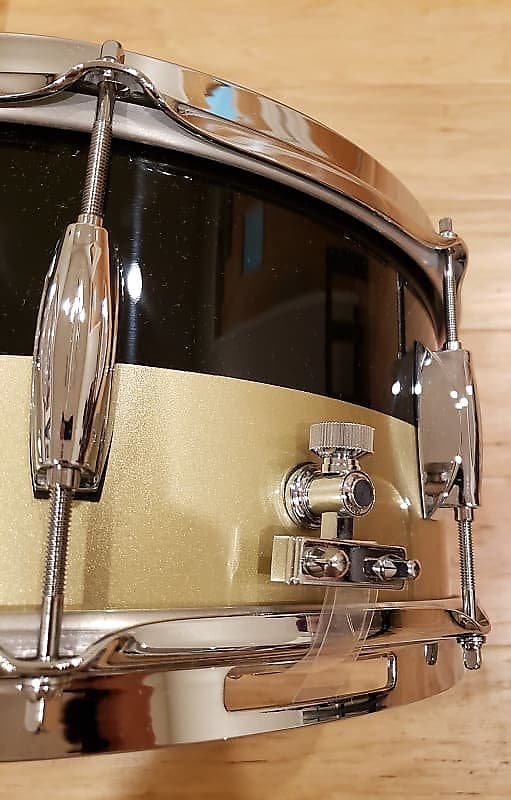 Caisse claire Gretsch Broadkaster 6,5 x 14 pouces en piano noir et brume dorée bicolore